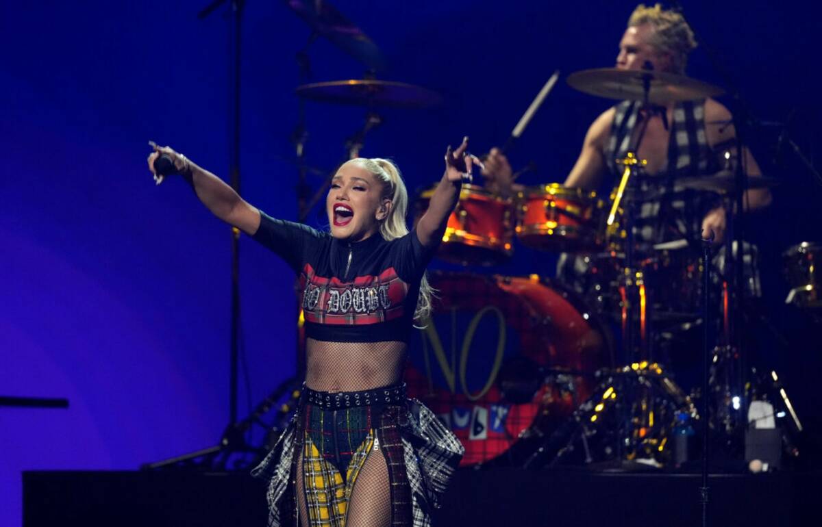 Gwen Stefani, left, and Adrian Young of No Doubt perform during the FireAid benefit concert on ...
