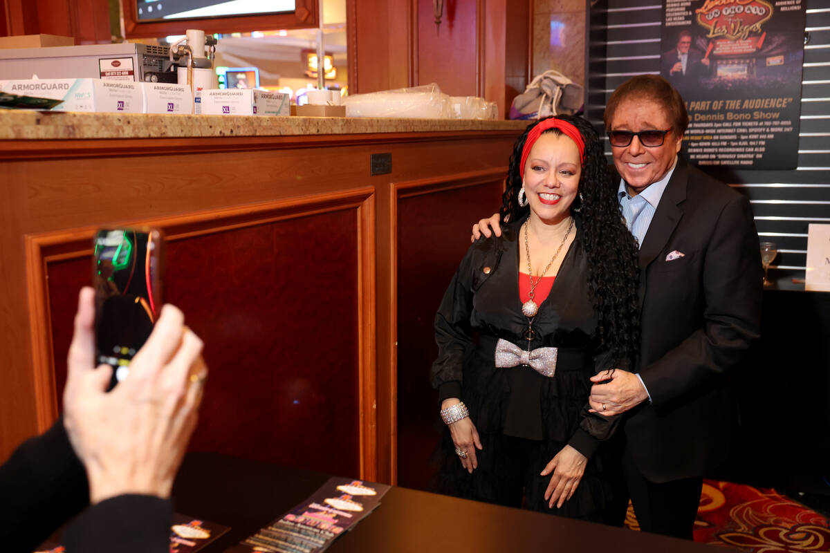 Dennis Bono and Niki Logan visit with the audience after performing in "The Dennis Bono Show" a ...