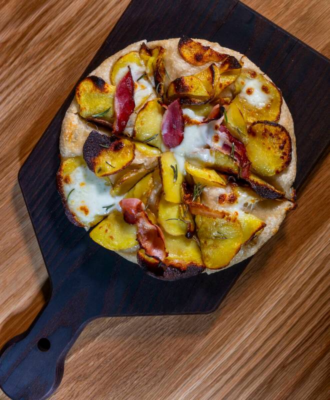 A Patate e Pancetta Pizza from Eataly Bar and Pizza al Padellino in Eataly at the Park MGM on ...