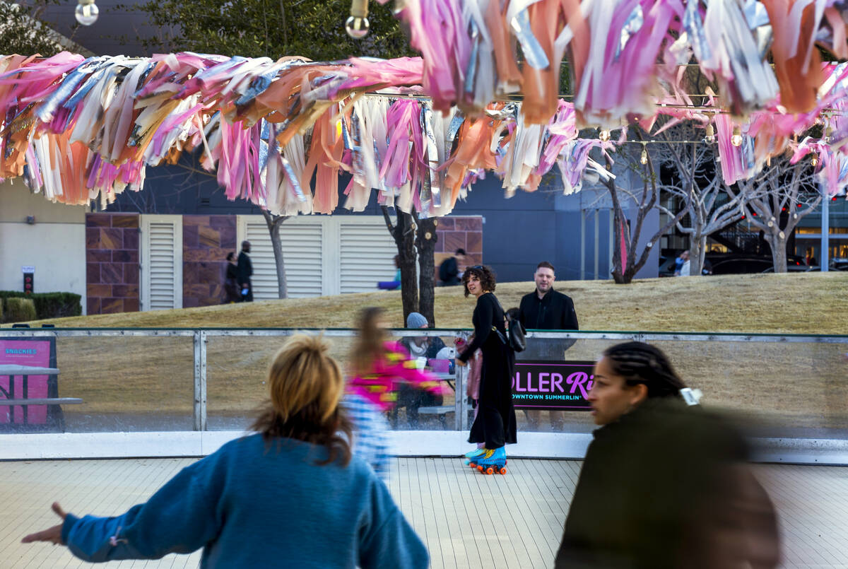 Skaters move about the Roller Rink Roller Rink at Downtown Summerlin presented by The Summer Ca ...