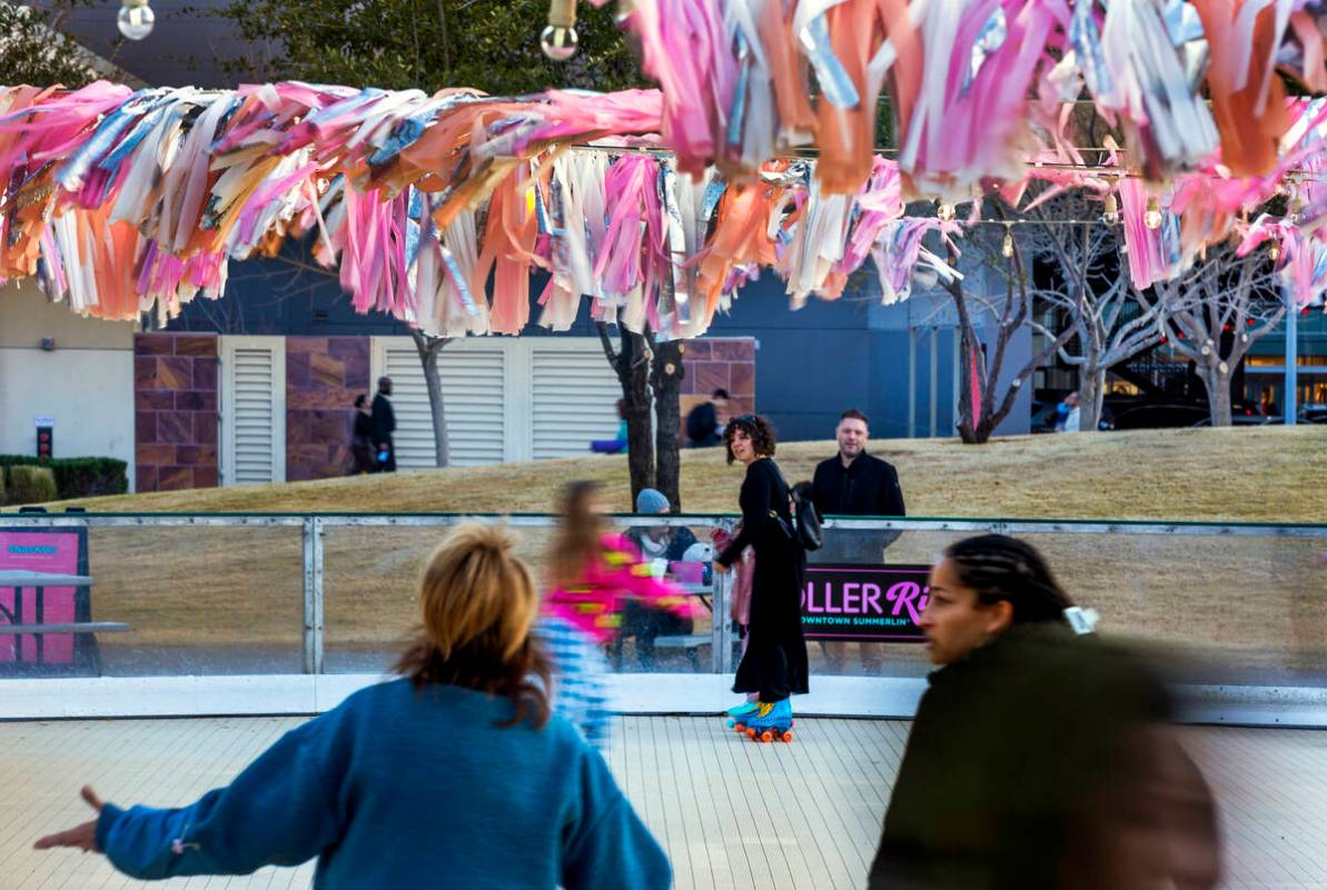 Skaters move about the Roller Rink Roller Rink at Downtown Summerlin presented by The Summer Ca ...