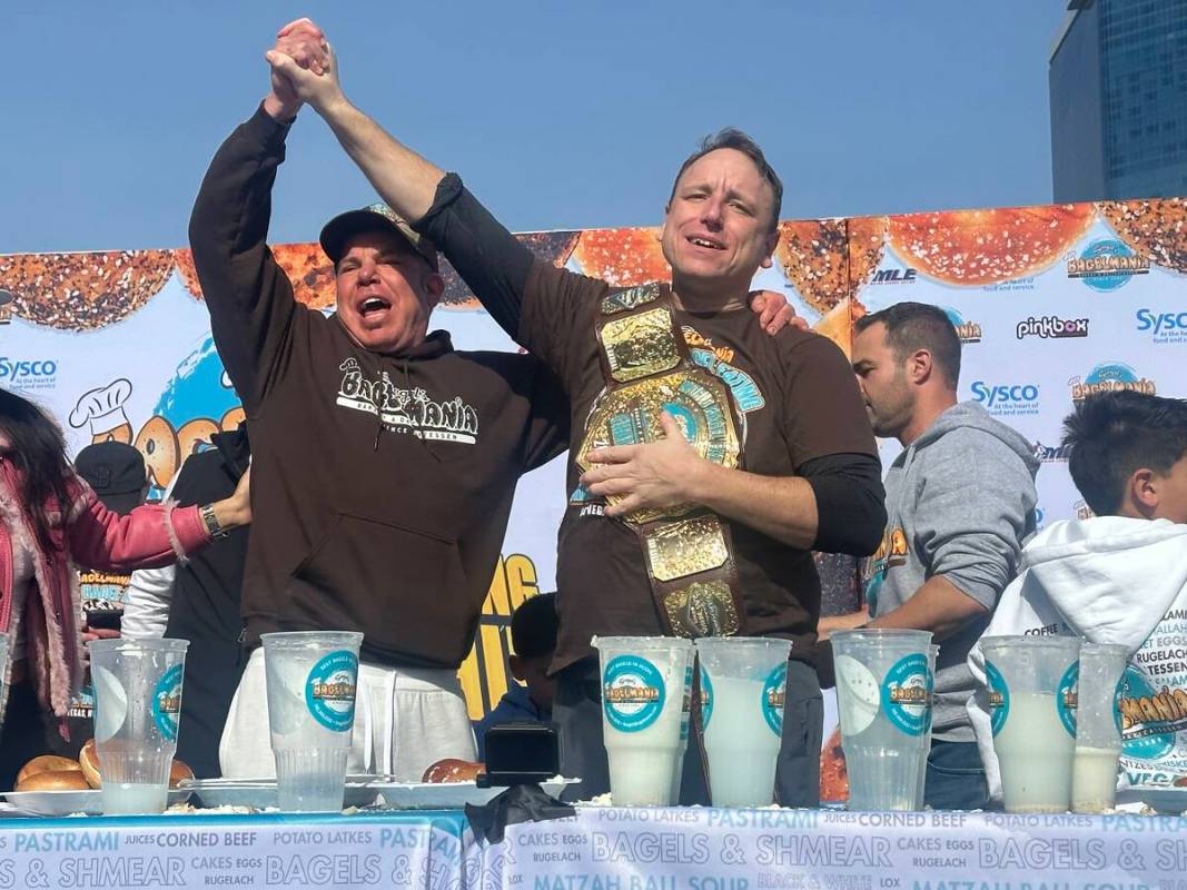 Siegel's Bagelmania owner Steven Siegel celebrates Joey Chestnut's Joey Chestnut's victory in t ...