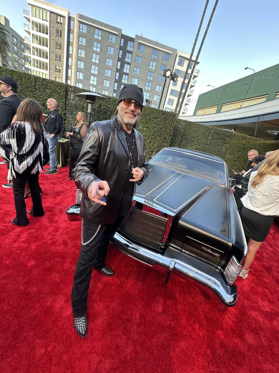 Danny Coker is shown with his Restored 1978 Lincoln Continental, which auctioned for $300,000 a ...