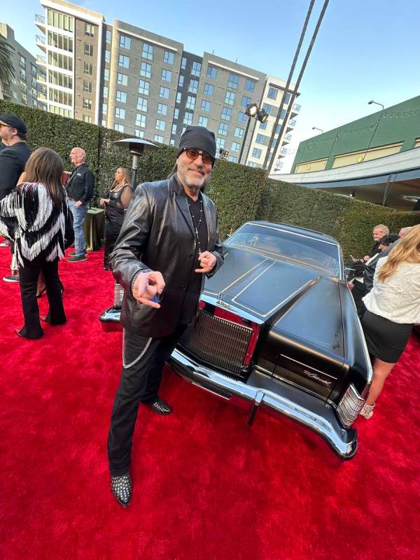 Danny Coker is shown with his Restored 1978 Lincoln Continental, which auctioned for $300,000 a ...