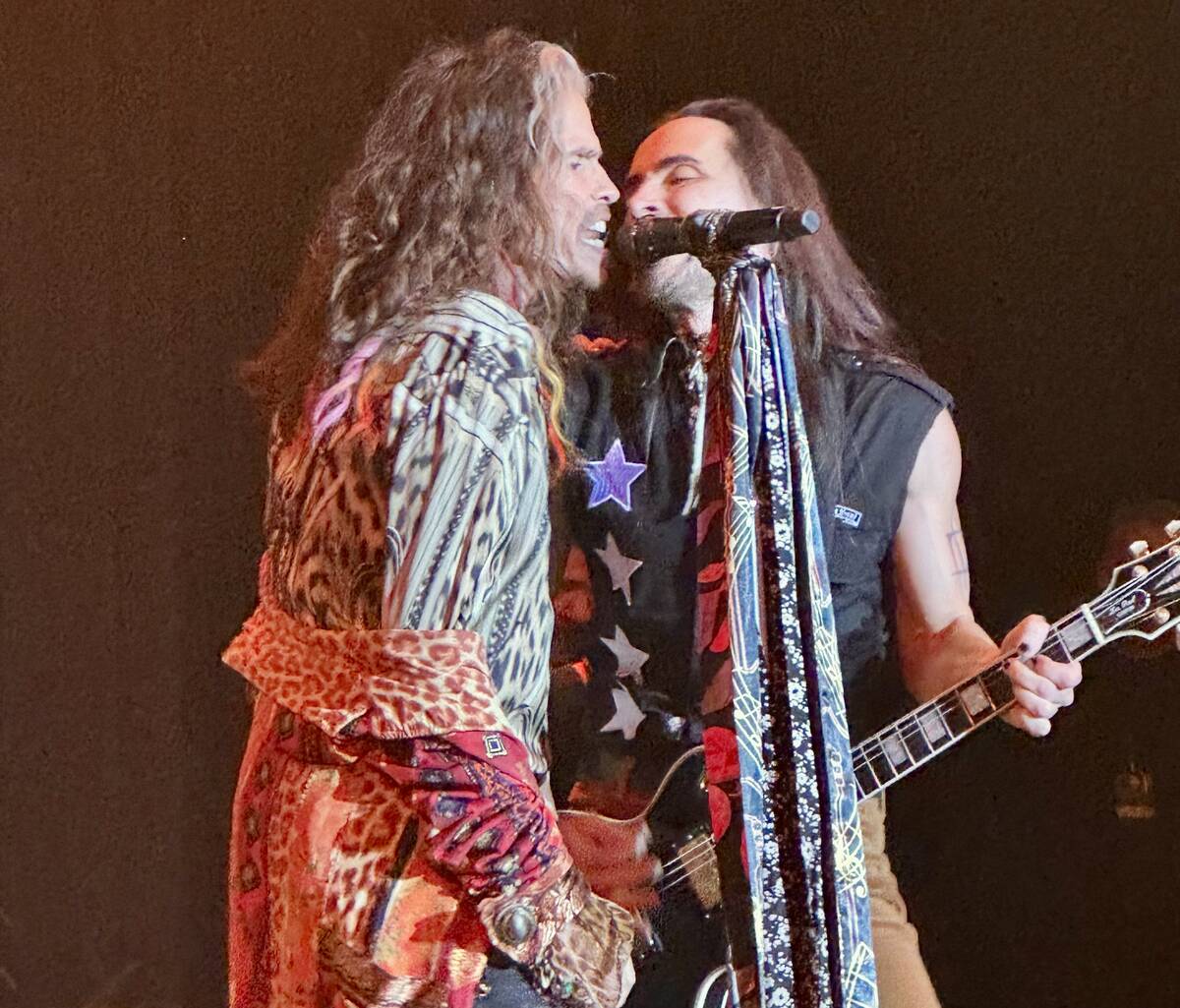 Steven Tyler of Aerosmith and Nuno Bettencourt perform at Janie's Fund charity show on Sunday, ...