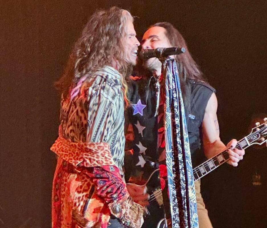 Steven Tyler of Aerosmith and Nuno Bettencourt perform at Janie's Fund charity show on Sunday, ...