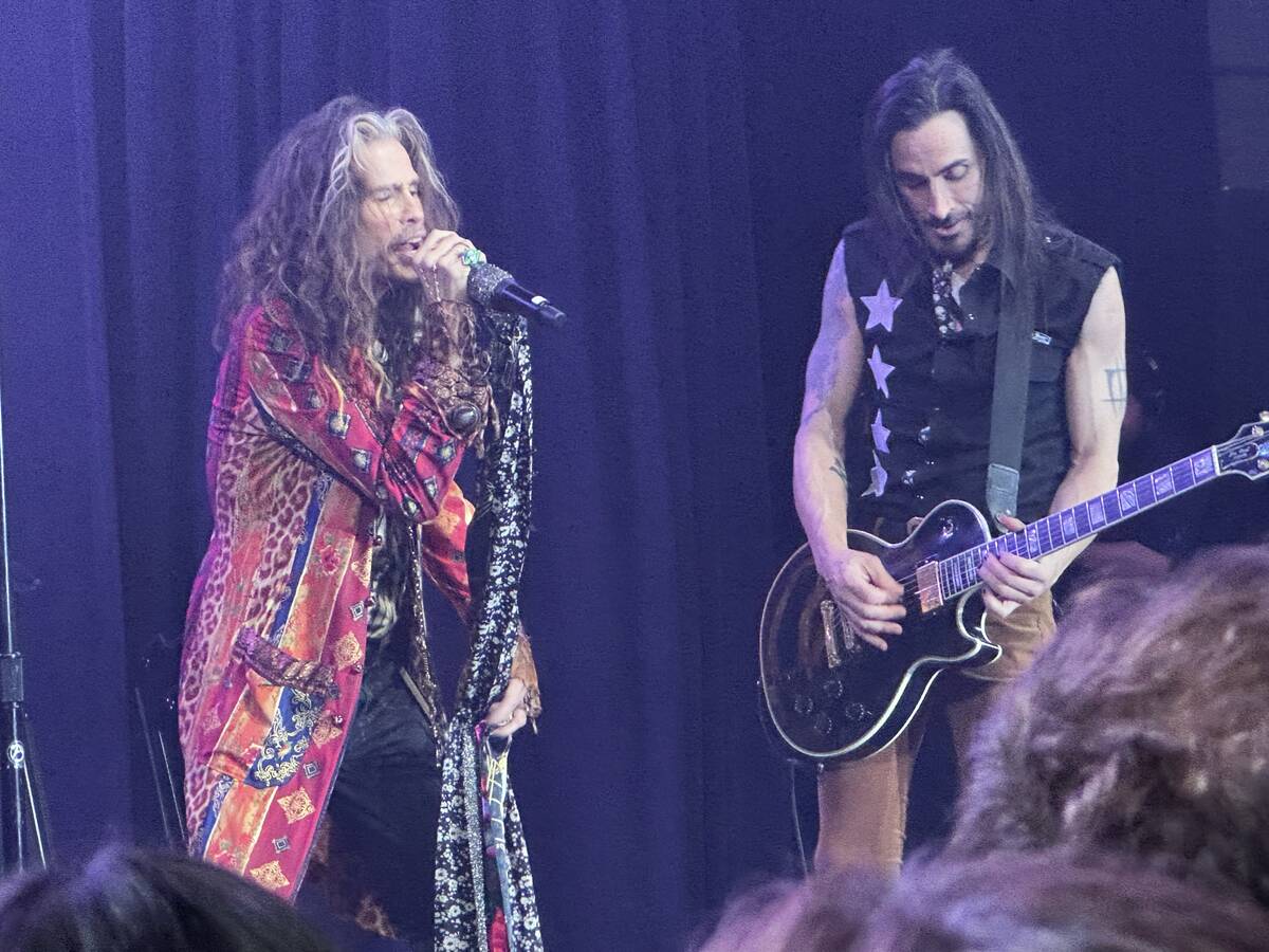 Steven Tyler of Aerosmith and Nuno Bettencourt perform at Janie's Fund charity show on Sunday, ...