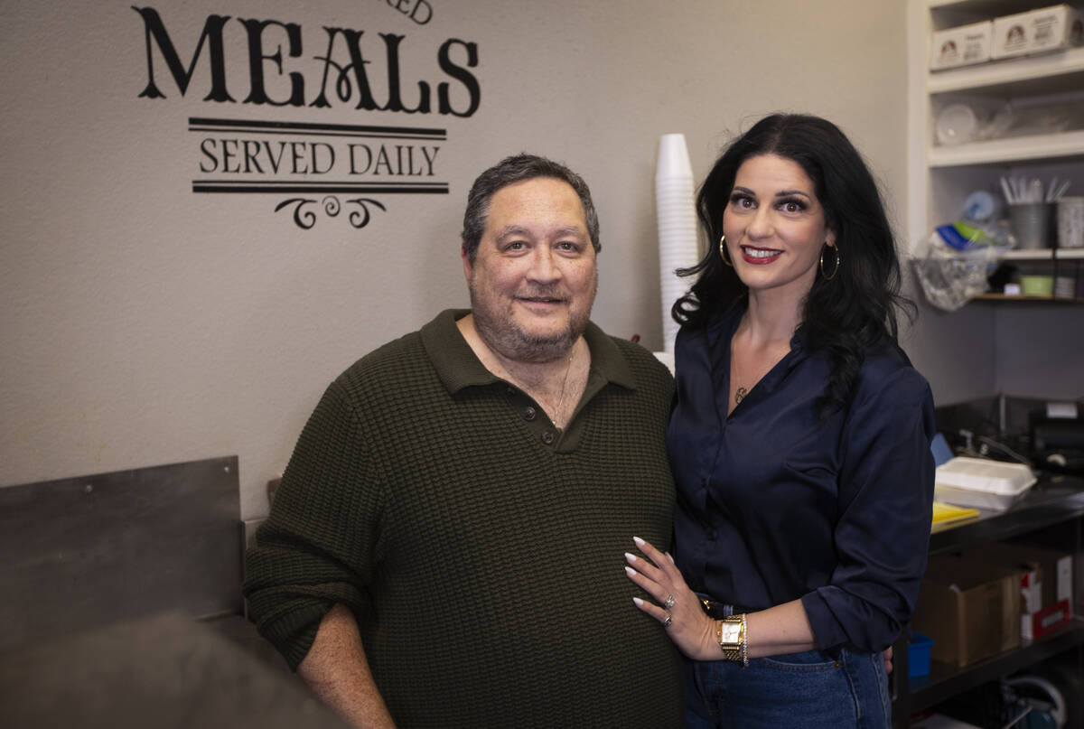 Tony Fisher and Andrea Eppolito, new owners of Weiss Deli, soon to be Fisher’s Deli, pos ...