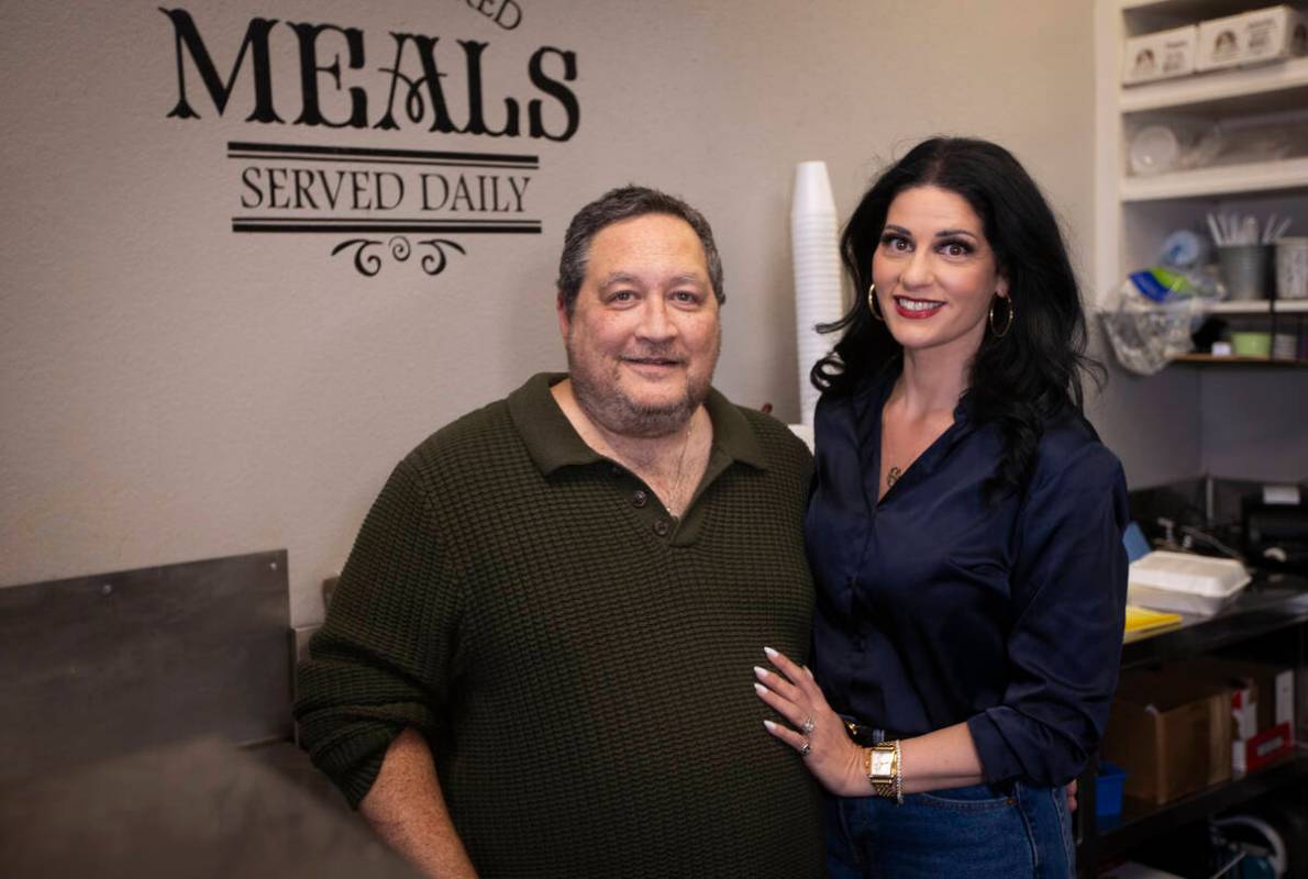 Tony Fisher and Andrea Eppolito, new owners of Weiss Deli, soon to be Fisher’s Deli, pos ...