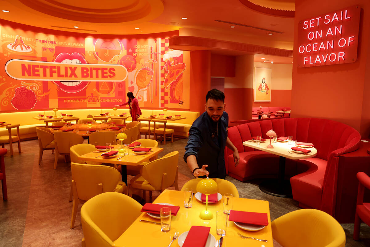 Assistant Manager Stephen Alsvig, right, and General Manager Edith Castro set up Netflix Bites ...
