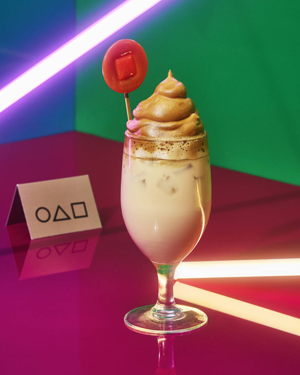 A Dalgona Rum Buzz cocktail from the Netflix Bites one-year culinary residency opening Feb. 11, ...