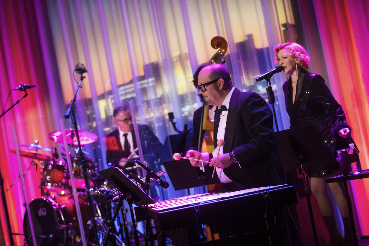 Band members perform with Melody Sweets at Myron’s at The Smith Center on Saturday, Feb. ...