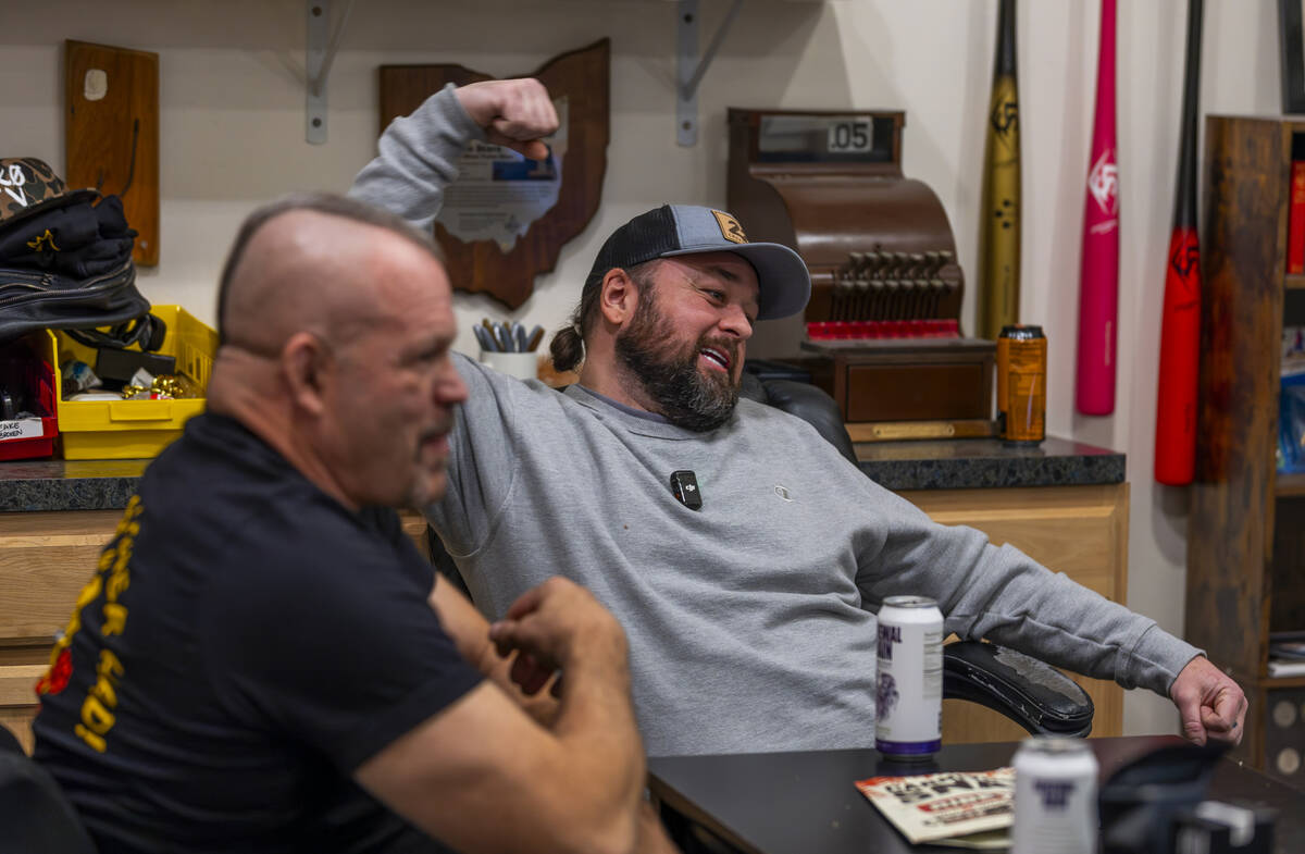 Former UFC champ Chuck Liddell and Austin "Chumlee" Russell watch videos for Liddell' ...