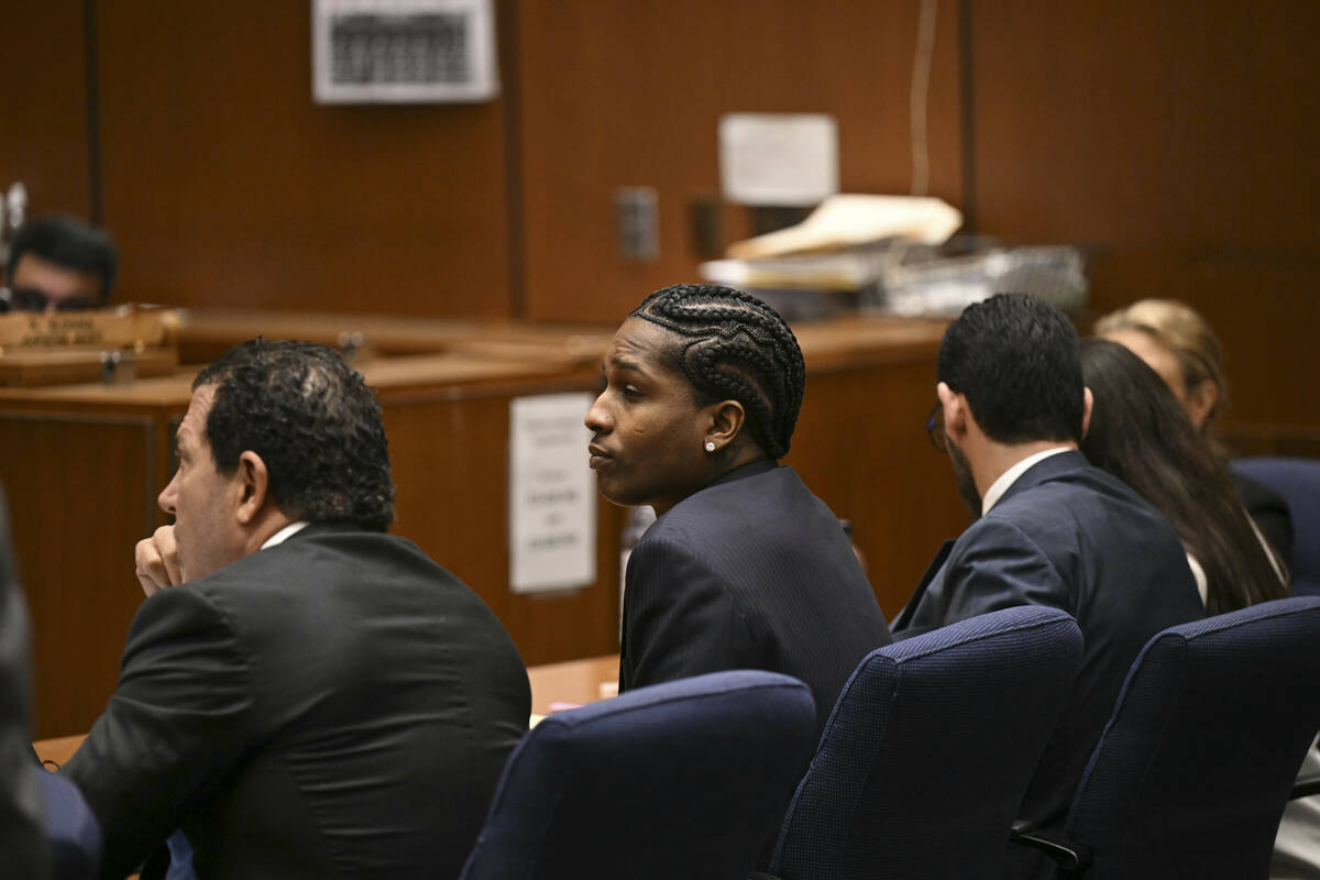 A$AP Rocky listens to closing arguments during his trial in Los Angeles, Friday, Feb. 14, 2025. ...
