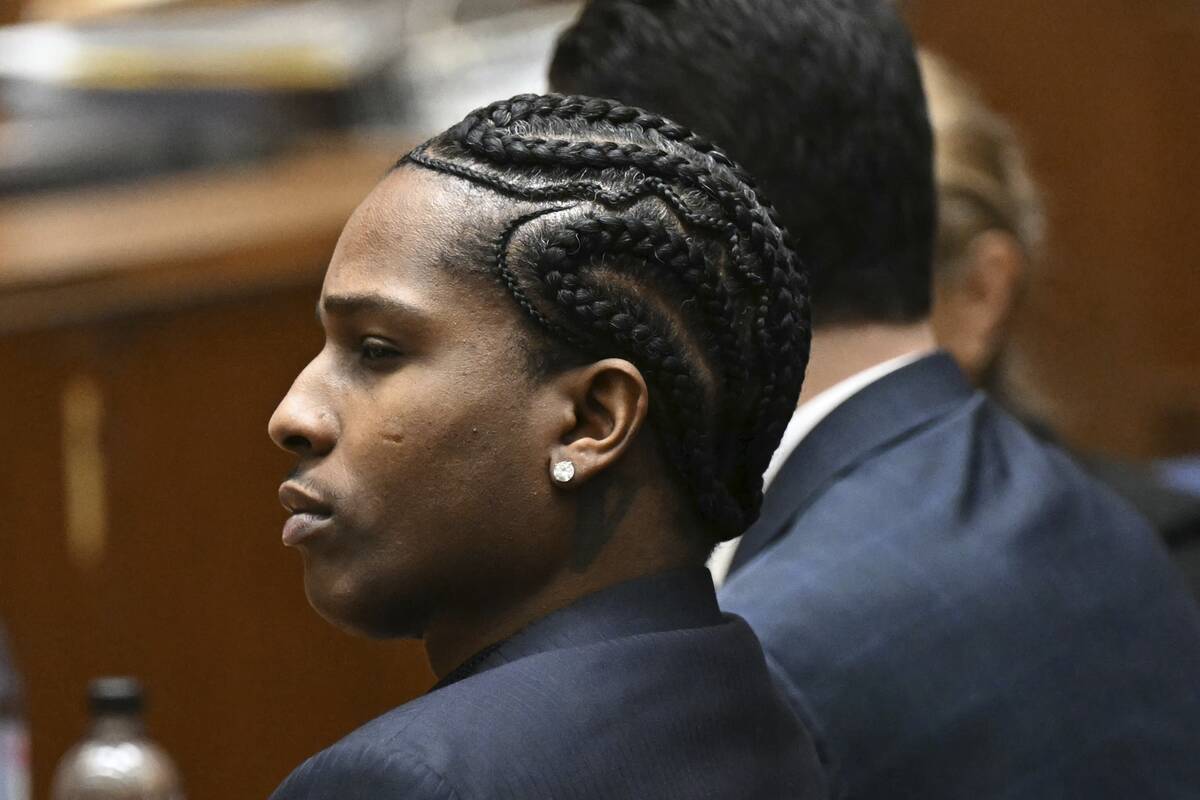 A$AP Rocky listens to closing arguments during his trial in Los Angeles, Friday, Feb. 14, 2024. ...