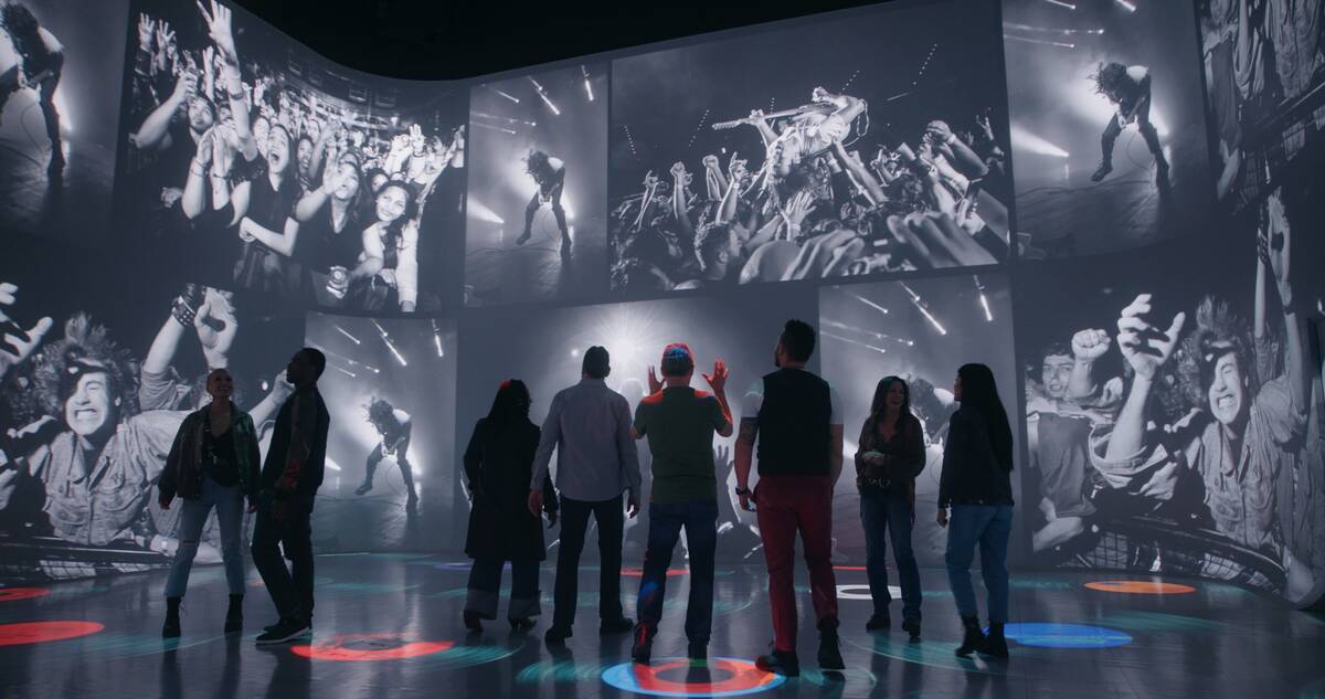A promotional image of "Rolling Stone Presents Amplified, The Immersive Rock Experience at Illu ...