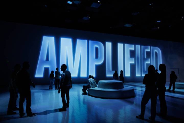 A promotional image of "Rolling Stone Presents Amplified, The Immersive Rock Experience at Illu ...