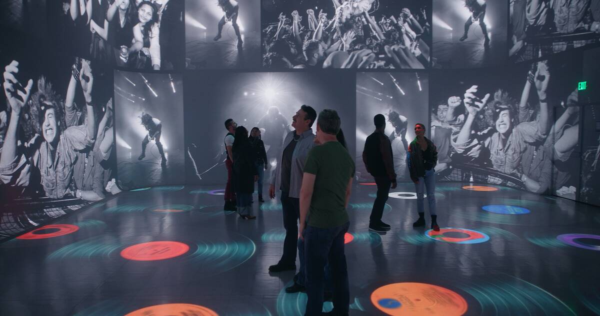 A promotional image of "Rolling Stone Presents Amplified, The Immersive Rock Experience at Illu ...