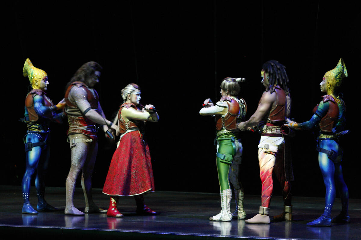 Performers with the Cirque du Soleil show “Ka” perform the battle scene during a me ...