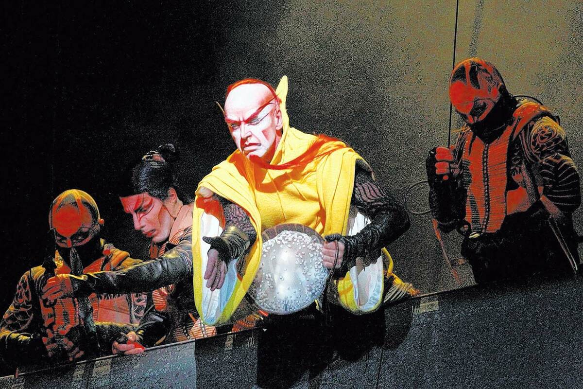 Performers with the Cirque du Soleil show “Ka” perform the battle scene during a me ...
