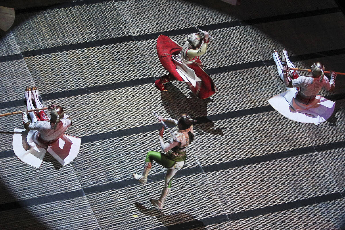 Performers in Cirque du Soleil’s “Ka” act out a battle scene at the MGM Grand ...
