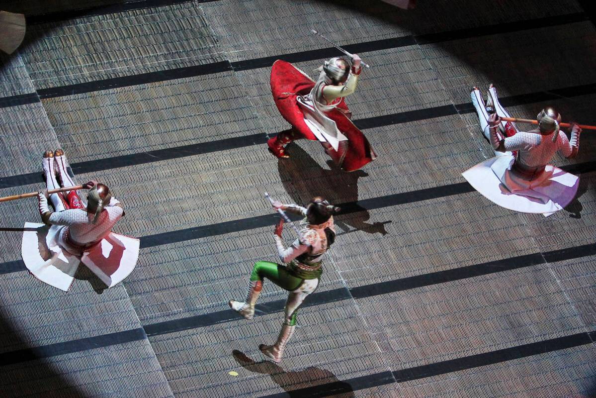 Performers in Cirque du Soleil’s “Ka” act out a battle scene at the MGM Grand ...