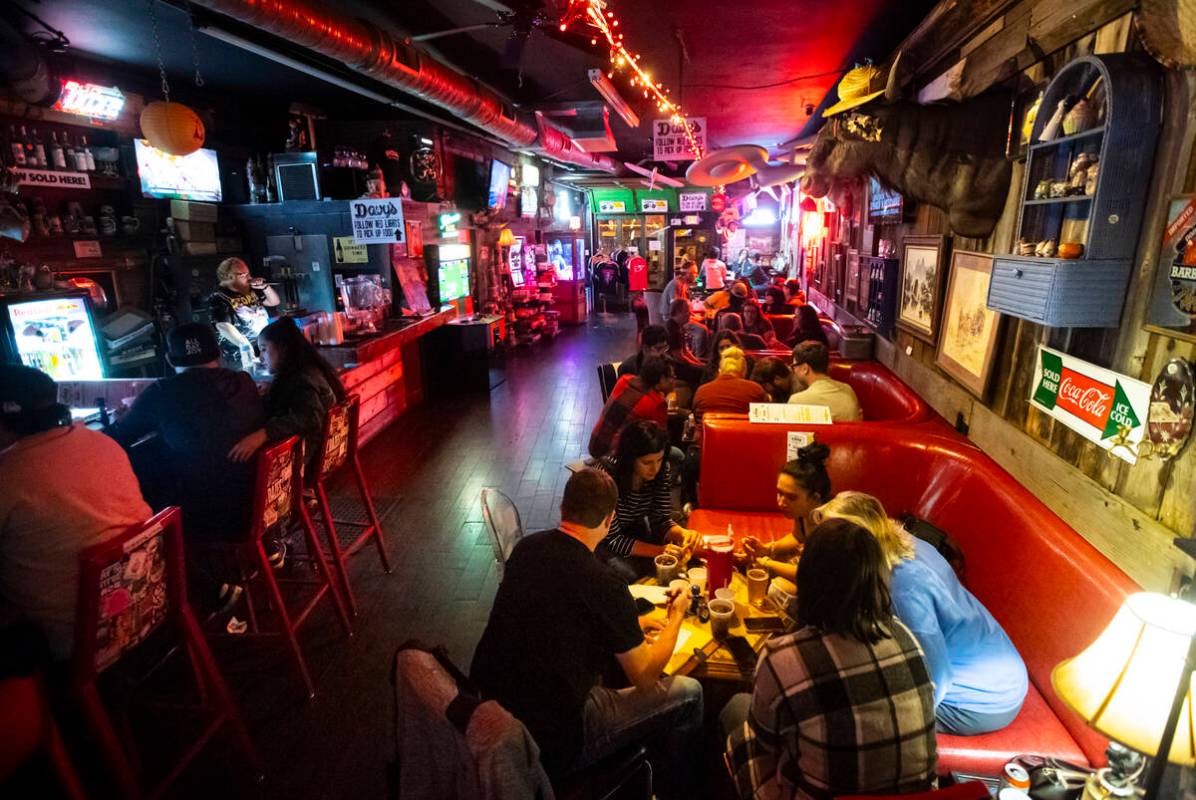 People participate in trivia night at ReBAR on Monday, Feb. 24, 2025, in Las Vegas. (Chase Stev ...