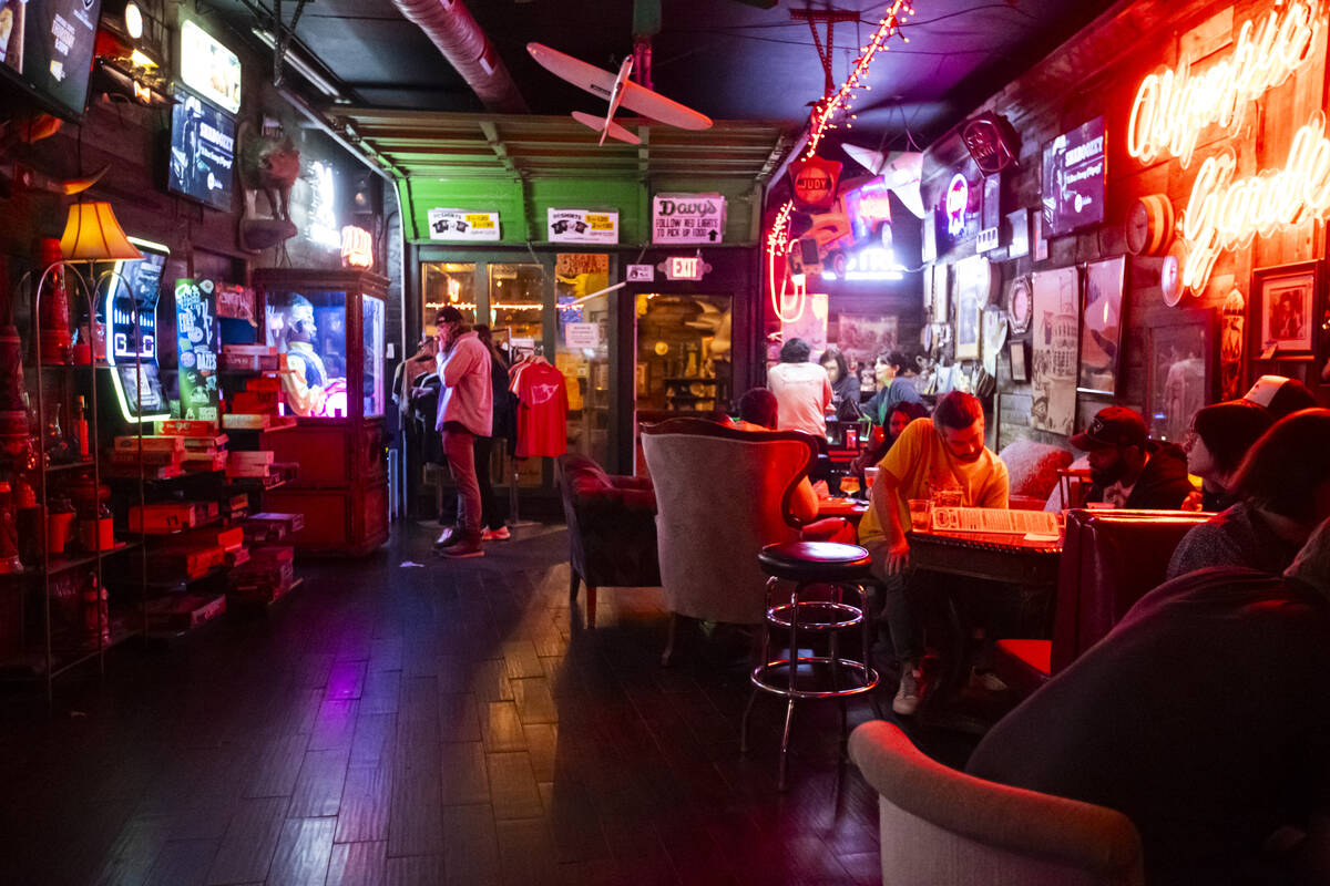 People participate in trivia night at ReBAR on Monday, Feb. 24, 2025, in Las Vegas. (Chase Stev ...