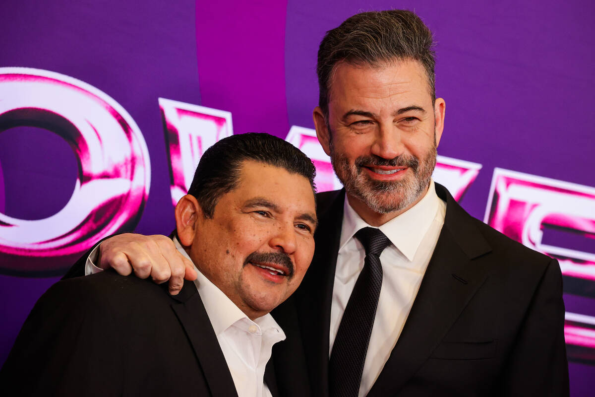Guillermo Rodriguez, left, and Jimmy Kimmel, pose together as they walk the red carpet at the P ...