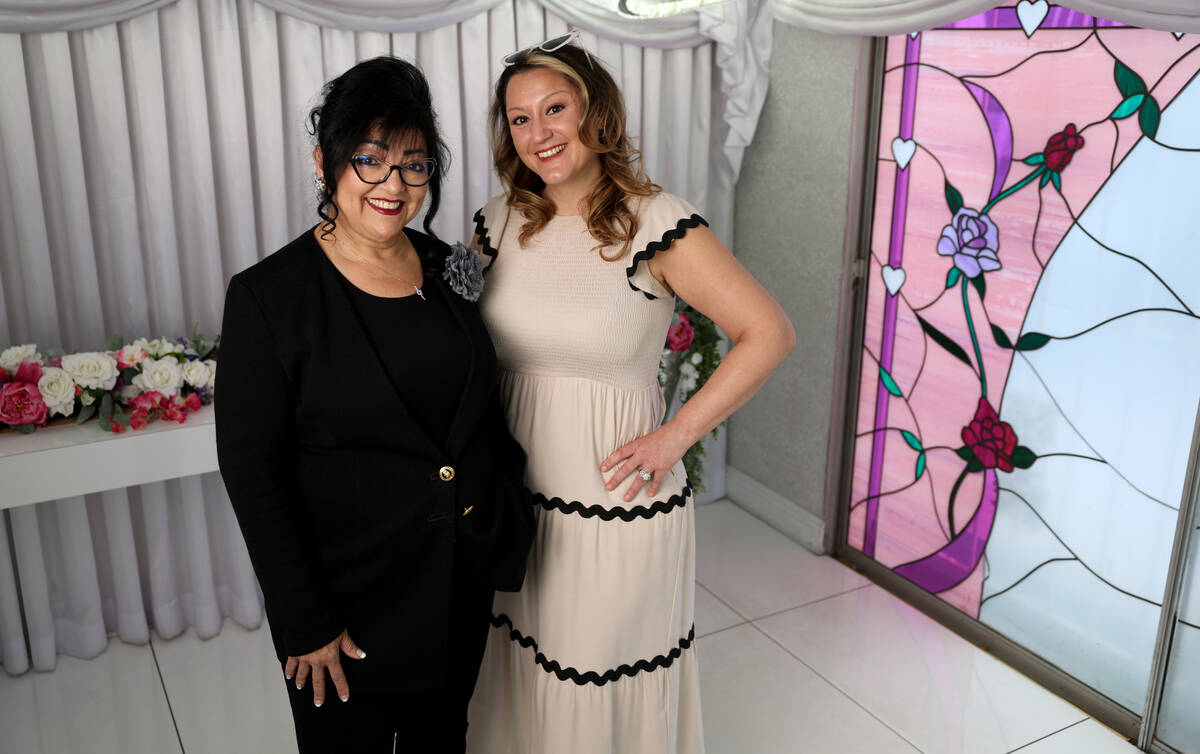 Melody Willis-Williams, president of the Little White Wedding Chapel, right, and officiant Dian ...