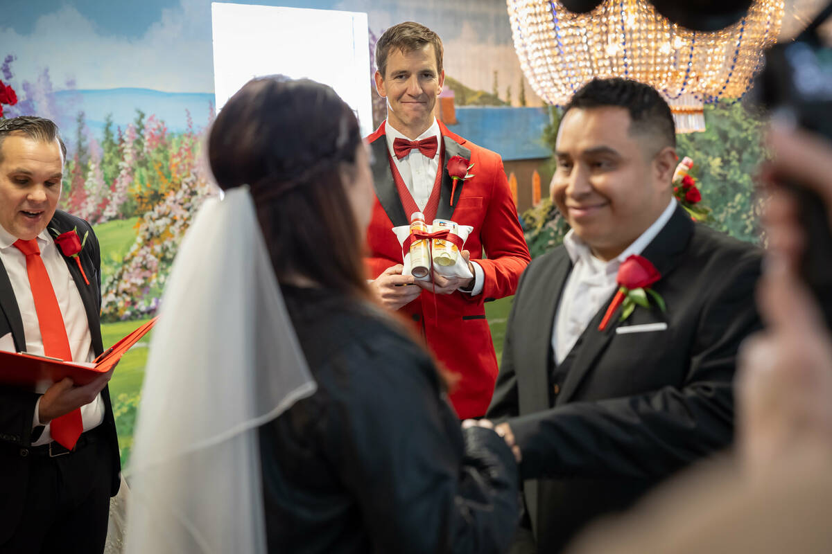 Eli Manning crashes a wedding as part of an Old Spice promotion. (Little White Wedding Chapel)