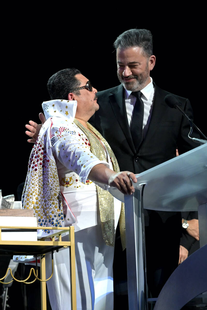 Guillermo Rodriguez, from left, and Jimmy Kimmel speak onstage as Keep Memory Alive hosts star- ...