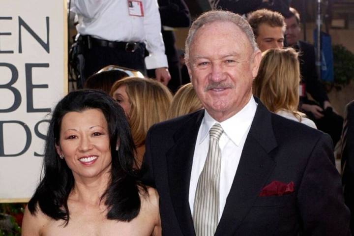 Gene Hackman arrives with his wife, Betsy Arakawa, for the 60th Annual Golden Globe Awards in B ...