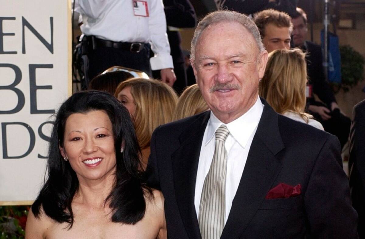 Gene Hackman arrives with his wife, Betsy Arakawa, for the 60th Annual Golden Globe Awards in B ...