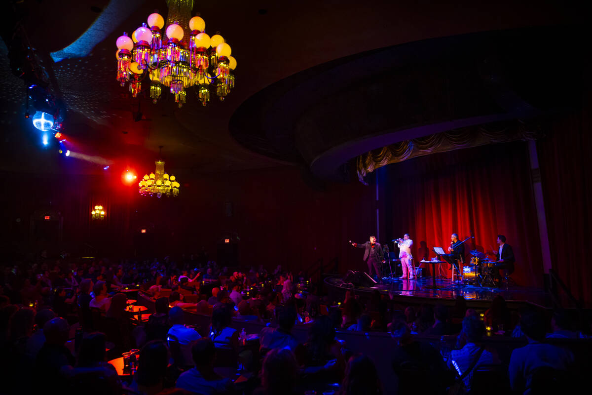 Comedian Murray Hill entertains the crowd at the Plaza Showroom in a show presented by Maverick ...