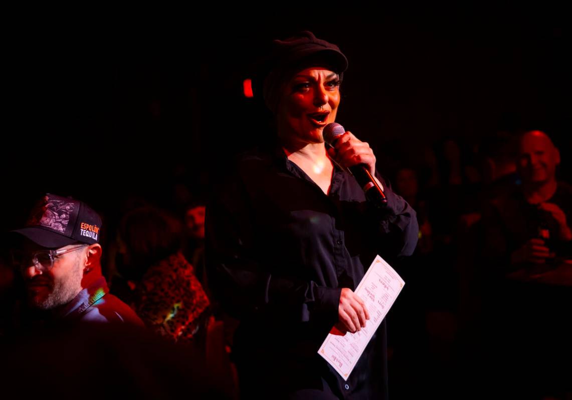 Amy Saunders, also known as Miss Behave, introduces comedian Murray Hill at the Plaza Showroom ...