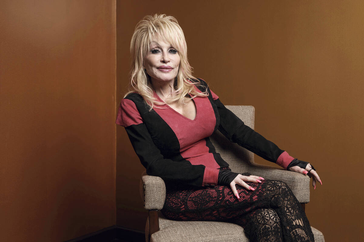 Dolly Parton poses at the Carnegie Medal of Philanthropy Ceremony in New York, on Oct. 13, 2022 ...