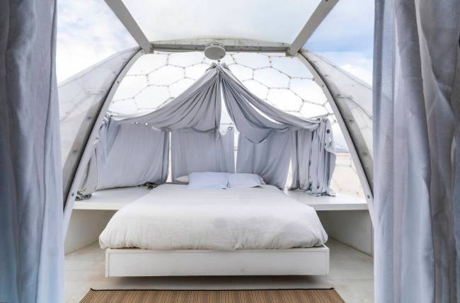 Zen Domes available to reserve feature a bedroom under the stars, kitchenette, bathroom and sit ...
