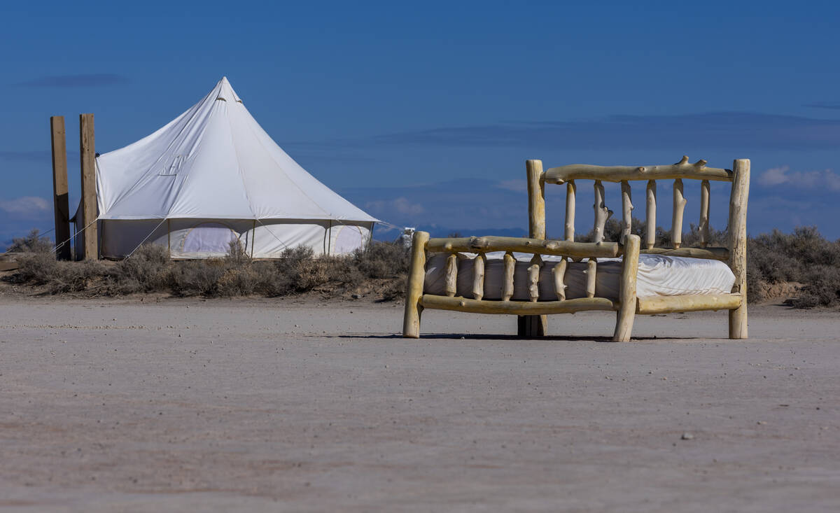 Tents are available to reservation with a giant bed on the playa for relaxing at Outpost X on T ...