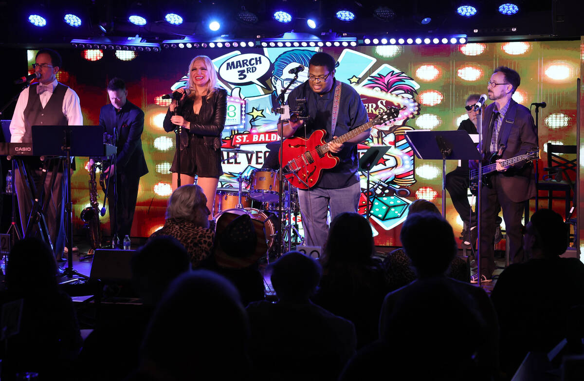 Kenny Davidsen, from left, Paige Strafella, Christian Phifer and Dennis Blair entertain the cro ...