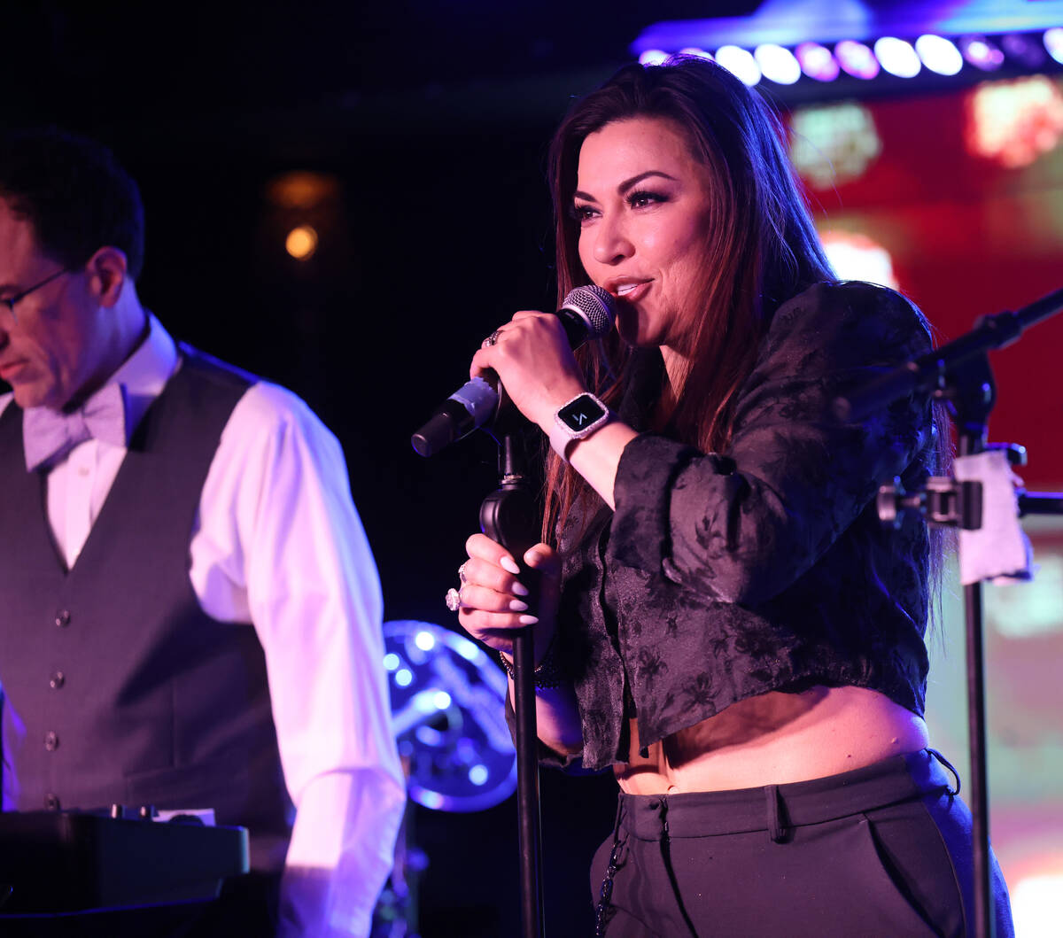 Christine Shebeck entertains the crowd during the annual John Katsilometes birthday party fundr ...