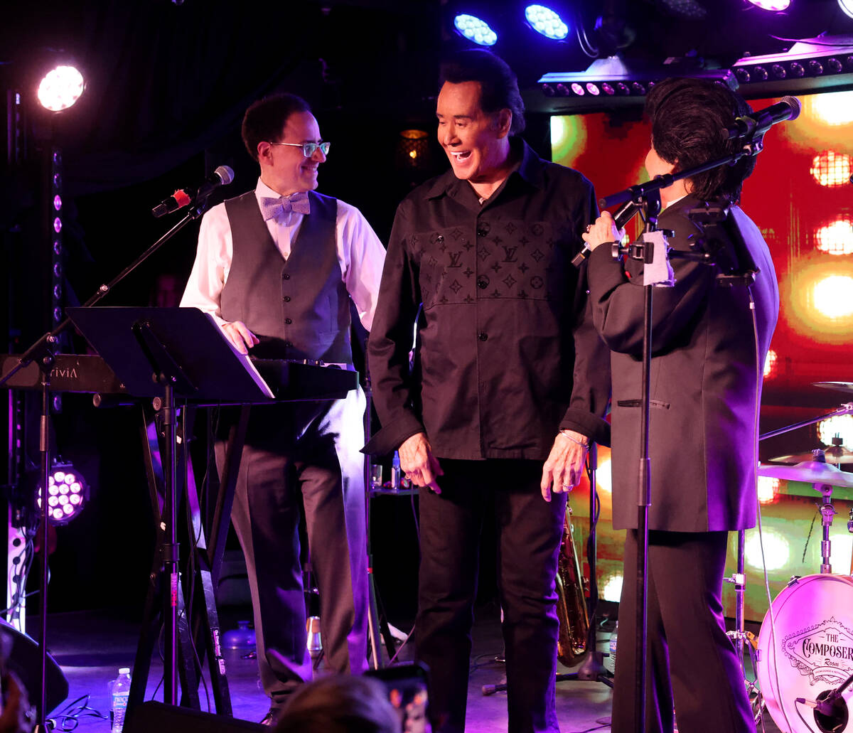 Kelly Clinton-Holmes does a Wayne Newton impression as Mr. Las Vegas himself sneaks up on her d ...