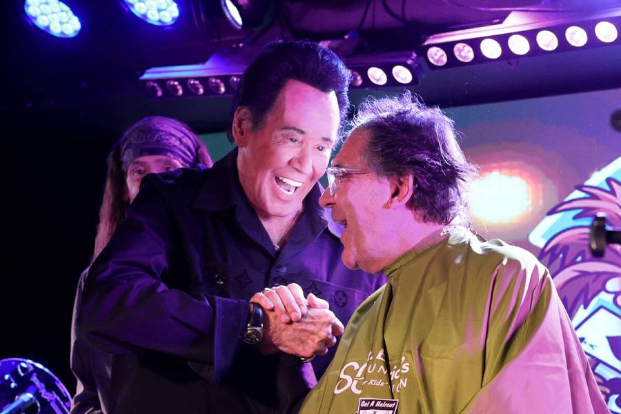 Las Vegas Review-Journal entertainment columnist John Katsilometes has his head shaved by Mr. L ...