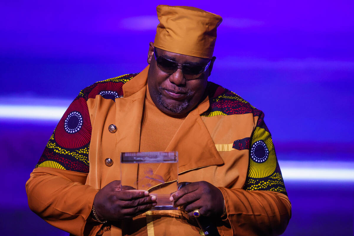 Kool Moe Dee looks down at his award during the Paid in Full Foundation’s Hip Hop Grandmaster ...