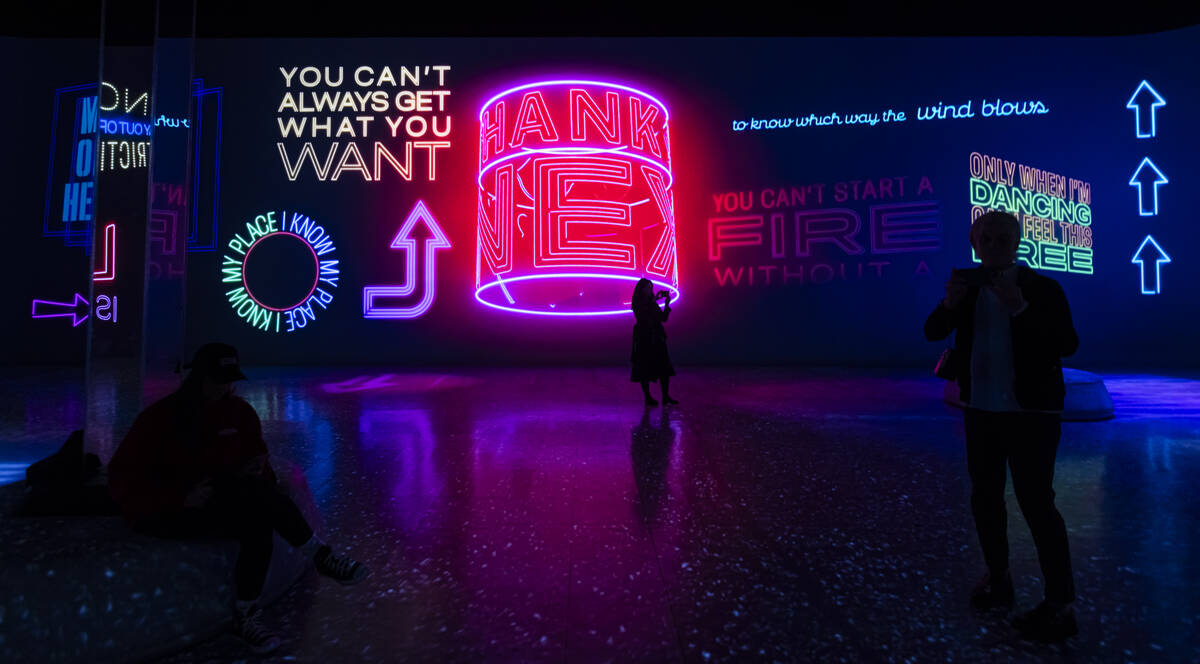 People take in a preview of “Rolling Stone Presents: Amplified, The Immersive Rock Exper ...