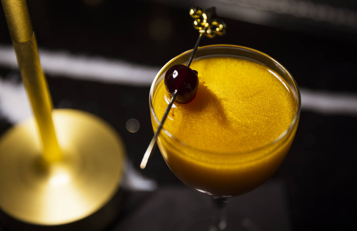 A glitter and gin cocktail at the John Wick Experience at Area15 on Thursday, March 13, 2025, i ...