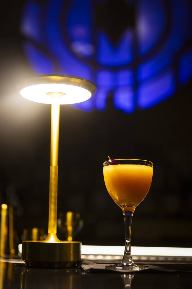 A glitter and gin cocktail at the John Wick Experience at Area15 on Thursday, March 13, 2025, i ...