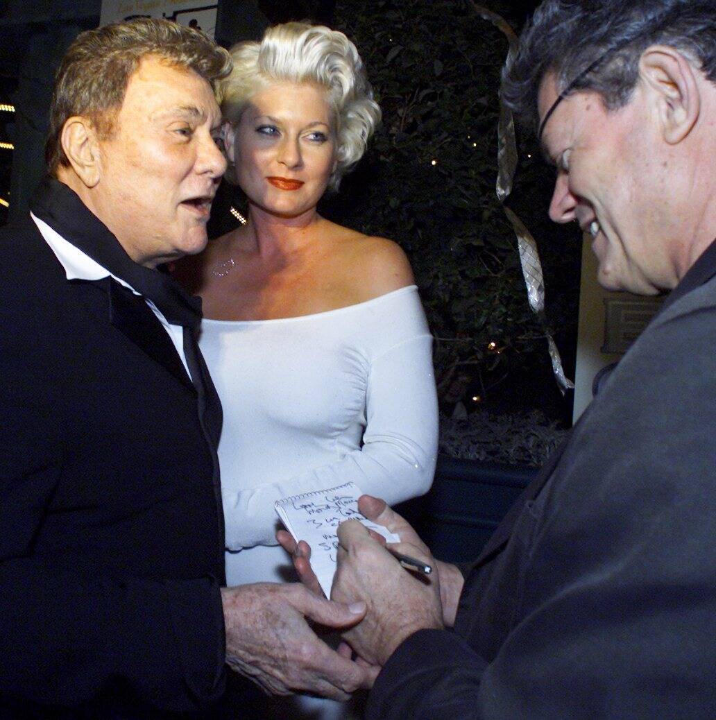 NORM! — Tony Curtis and his wife, Jill, talk with R-J columnist Norm Clarke outside of th ...