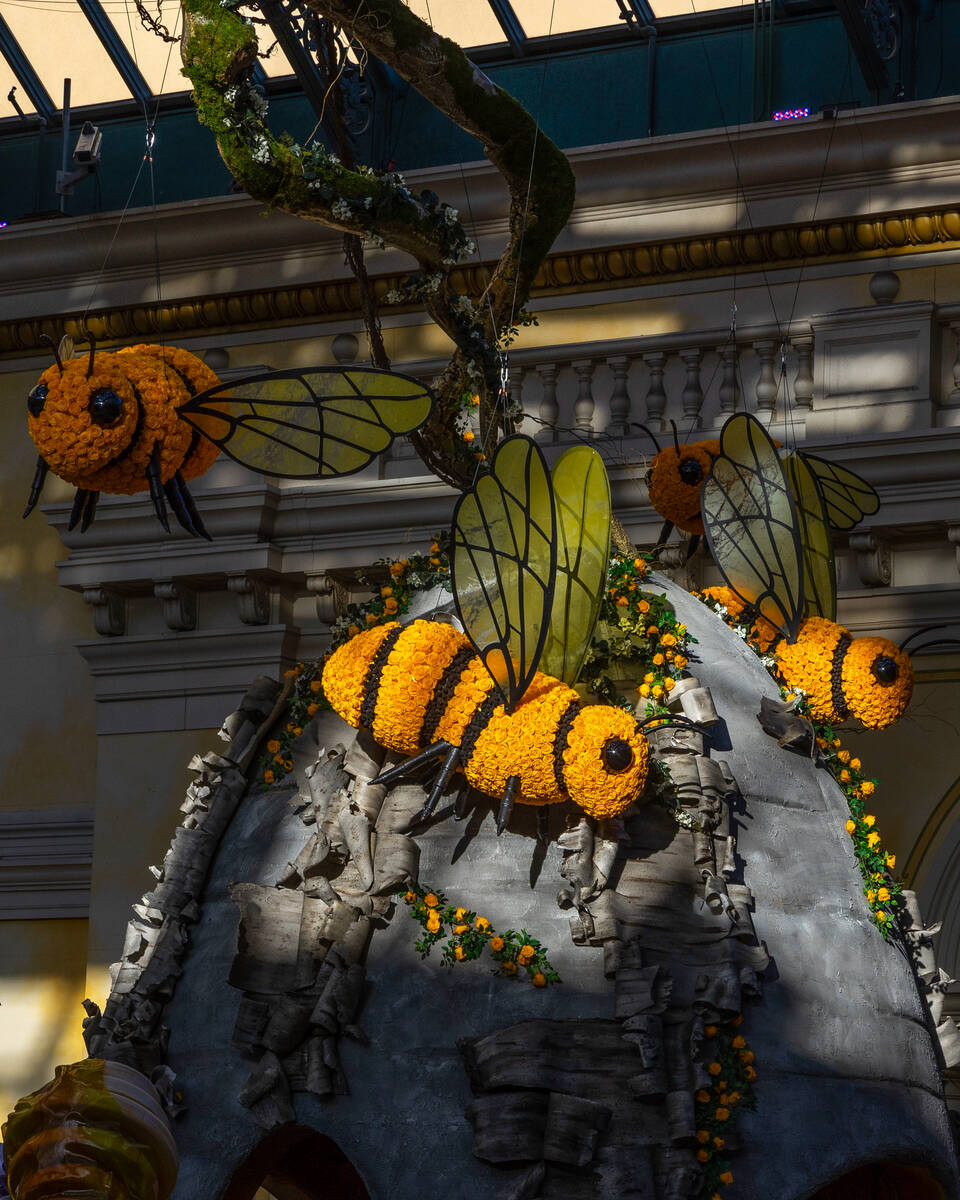 Bees made of roses fly about a hive as part of the "The Birds and the B’s” s ...