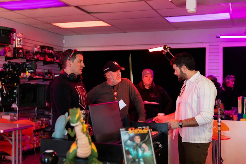 Writer-director Jonathan L. Bowen, left, talks with actor Jesse Metcalfe on the Las Vegas set o ...
